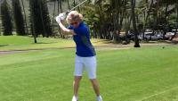 Martha Strange playing golf